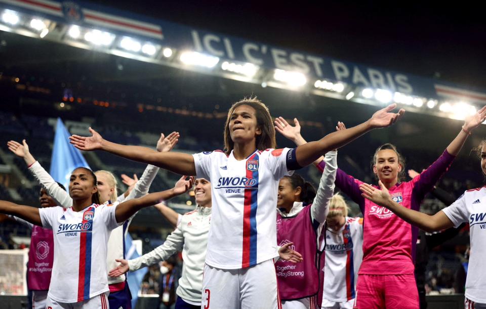 Lyon players celebrate their Champions League semifinal win over rival PSG.