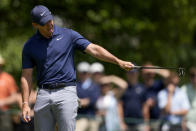 Rory McIlroy, of Northern Ireland, reacts after missing a putt on the third hole during the third round of the Wells Fargo Championship golf tournament at the Quail Hollow Club Saturday, May 11, 2024, in Charlotte, N.C. (AP Photo/Chris Carlson)