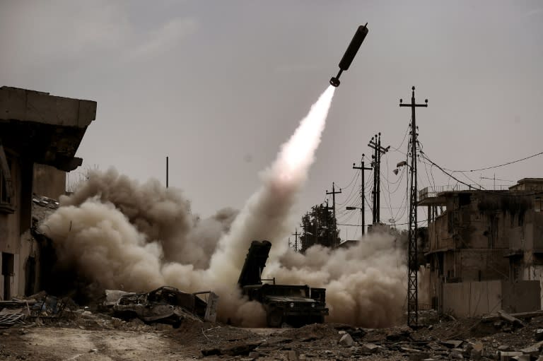 Iraqi troops fire artillery towards Islamic State group positions in west Mosul on March 11