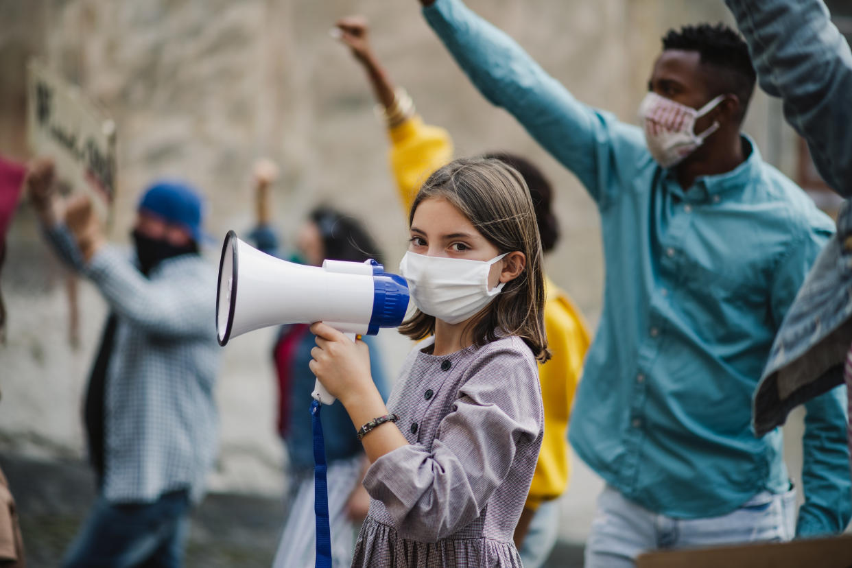 A child psychologist shares how to approach politics as a parent. (Photo: Getty Creative)