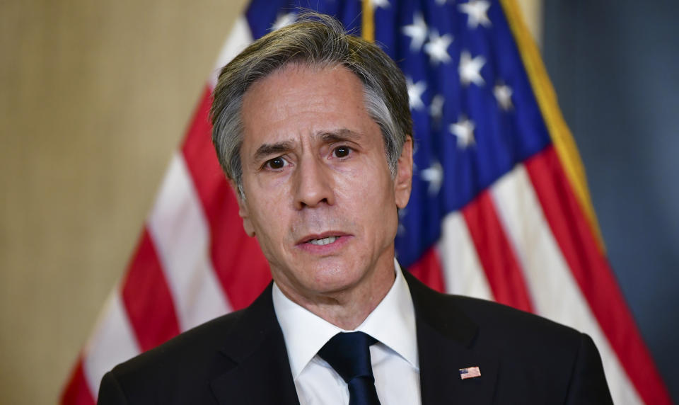 Secretary of State Antony Blinken speaks to the media after a closed-door morning session of US-China talks in Anchorage, Alaska on Friday, March 19, 2021. (Frederic J. Brown/Pool via AP)