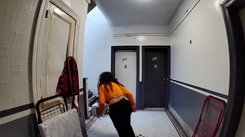 Adriana Alvarez can be seen Jan. 23 in footage from her apartment's doorbell security camera chasing after a man who was attempting to abduct her 18-year-old daughter.