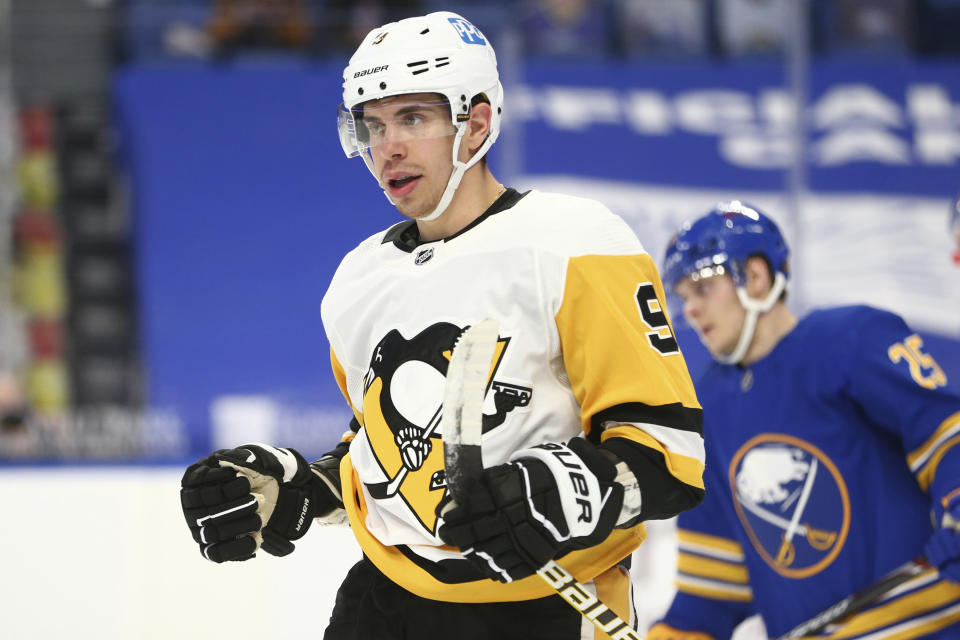 Pittsburgh Penguins forward Evan Rodrigues (9) celebrates his goal during the second period of an NHL hockey game against the Buffalo Sabres, Saturday, April 17, 2021, in Buffalo, N.Y. (AP Photo/Jeffrey T. Barnes)