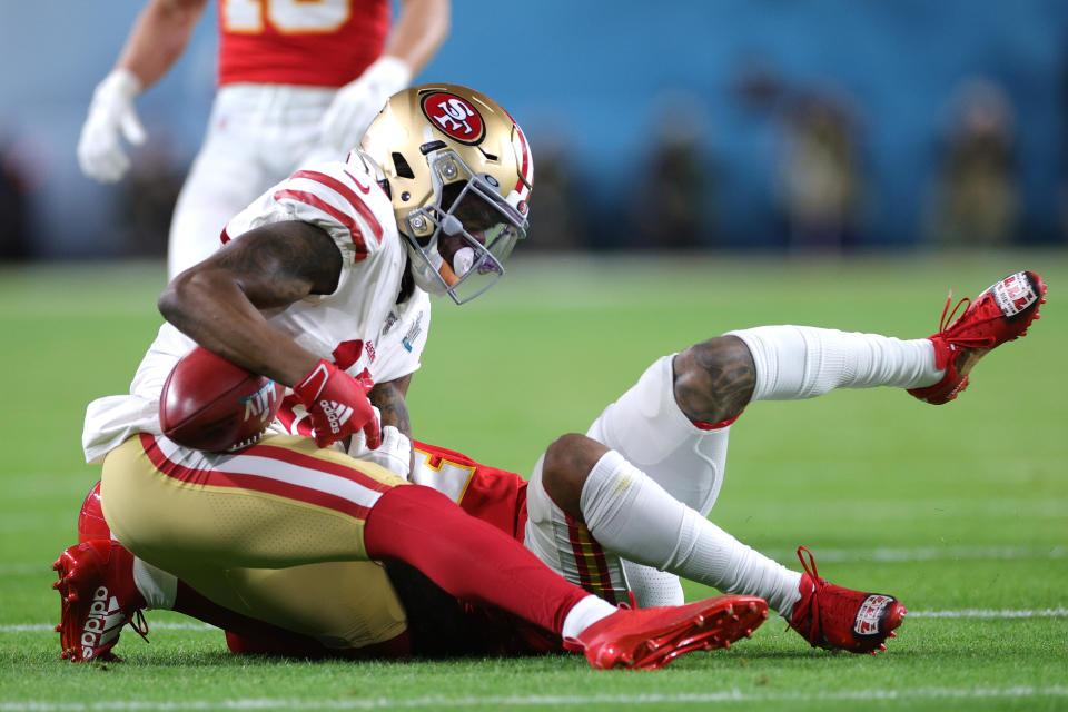 MIAMI, FLORIDA - FEBRUARY 02: Richie James #13 of the San Francisco 49ers is tackled against the Kansas City Chiefs in Super Bowl LIV at Hard Rock Stadium on February 02, 2020 in Miami, Florida. (Photo by Jamie Squire/Getty Images)