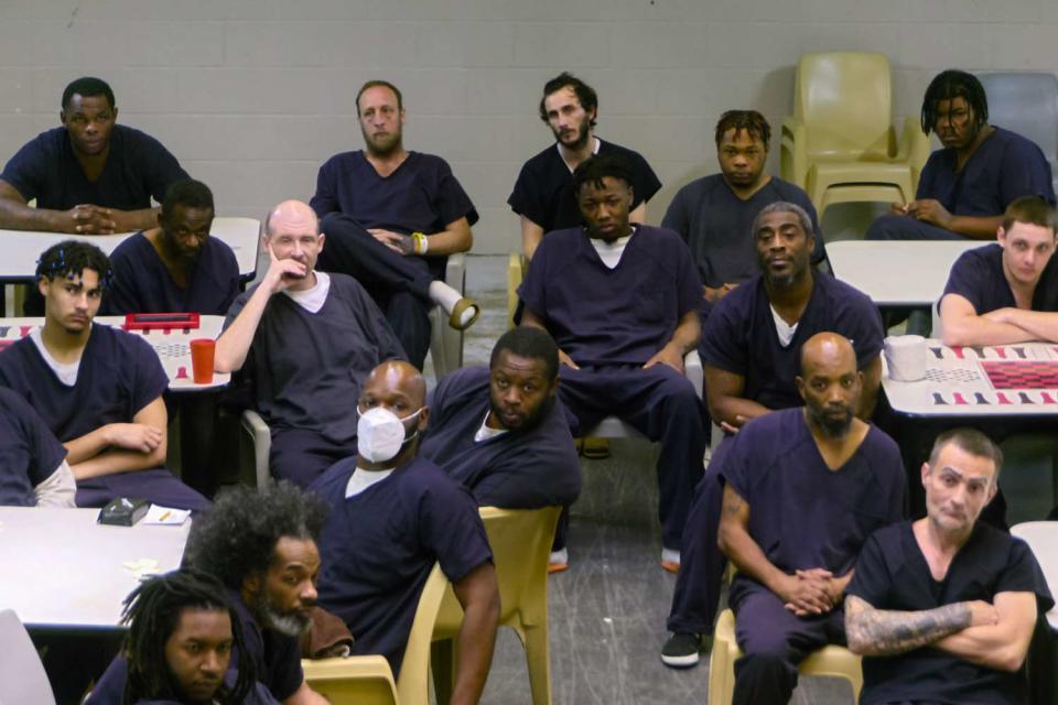 <p>Netflix</p> Prisoners in an episode of 