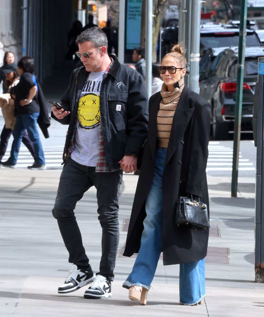 Ben Affleck often looks unhappy going to industry events with J-Lo. AbacaPress / SplashNews.com