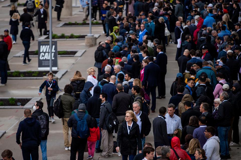 People line up for the Berkshire Hathaway 2022 Annual Shareholders Meeting weekend outside the CHI Health Center in Omaha, Nebraska, on Saturday.