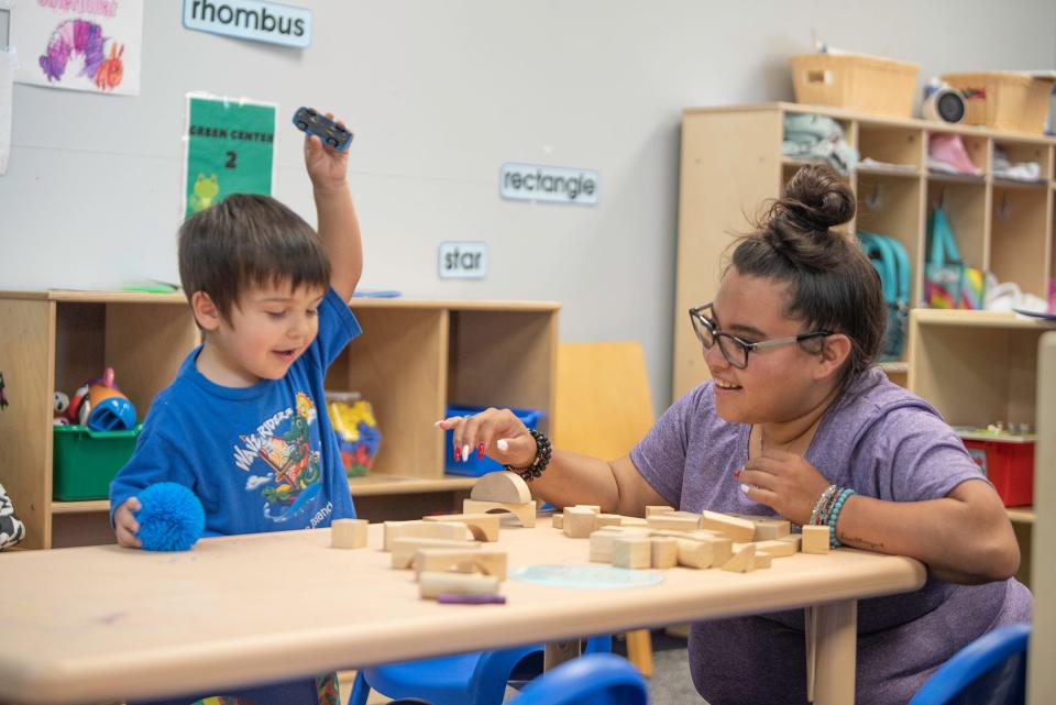 Teachers aide Gabby Espinoza, right, and Elijah Stallones, 2, create shapes with building blocks at the Life Center Academy at St. Mary-Corwin PCC Campus on Thursday, July 6, 2023.