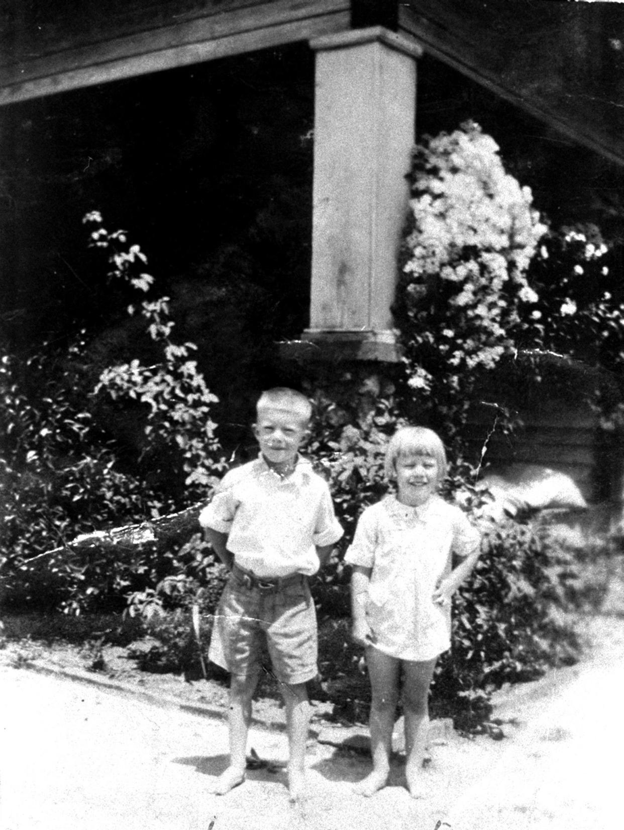 Jimmy Carter, 6, is with his sister, Gloria, 4, in 1931, in Plains, Ga.