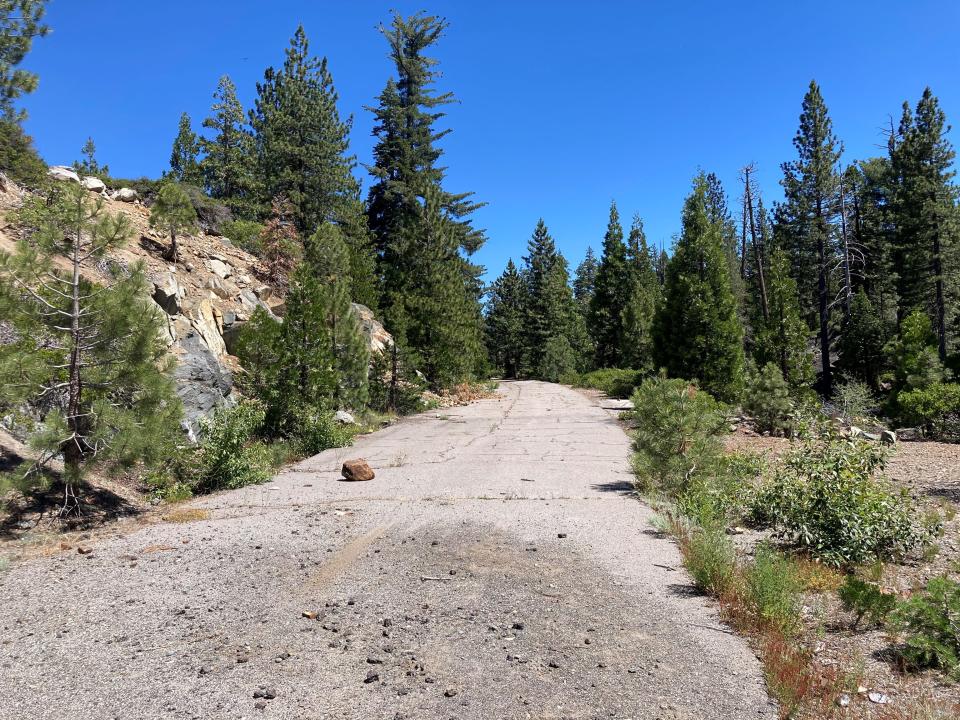 An abandoned section of Lincoln Highway near Eagle Lakes Road, closed due to being private property.