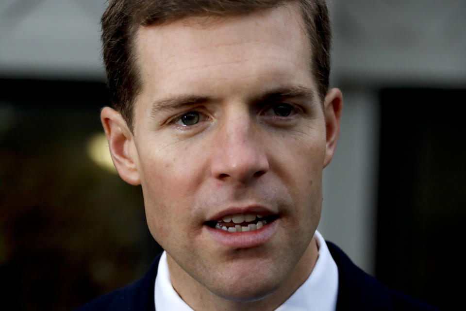 FILE - In this Nov. 6, 2018, file photo, Rep. Conor Lamb, D-Pa, talks with reporters after voting in Mt. Lebanon, Pa. As of Friday morning, Sept. 27, 2019, an Associated Press survey of most of the House Democrats showed six as either not supporting or undecided on the inquiry called this week by House Speaker Nancy Pelosi. Lamb initially was “undecided” on a formal impeachment inquiry but shifted his position on Friday and issued a statement that avoided the words “impeachment” and “Trump.” (AP Photo/Gene J. Puskar, File)