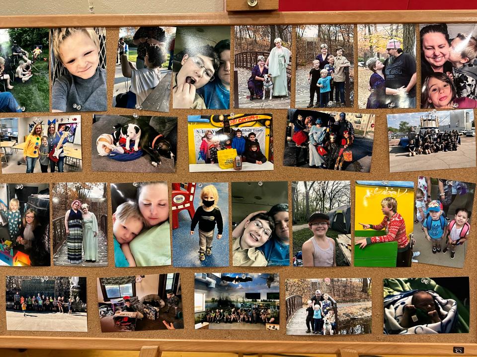 A collage of photos of the McLuer boys and their friends and family displayed at their funeral Wednesday in Mason City. The four brothers died in a Nov. 16 house fire.