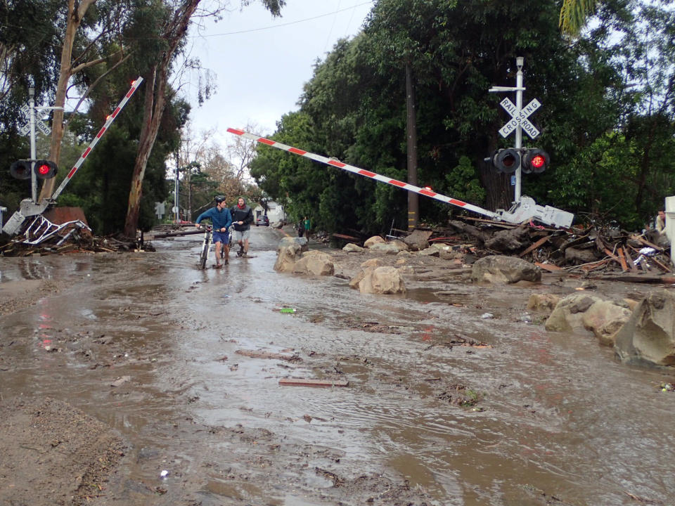 A section of the Union Pacific Railroad is blocked by mudflow and debris in Montecito.