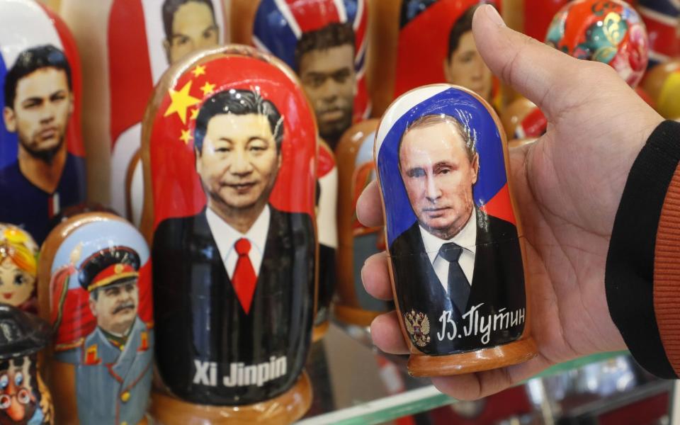 Russian dolls of the two world leaders on sale in Moscow - YURI KOCHETKOV/EPA-EFE/Shutterstock