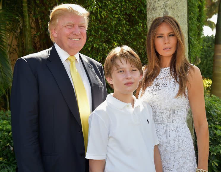 Melania Trump poses with Donald and Barron. (Photo: Getty Images)