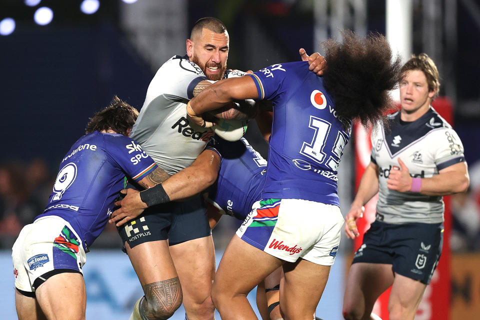 Seen here, Melbourne's Nelson Asofa-Solomona takes a hit-up in the NRL match against the Warriors. 