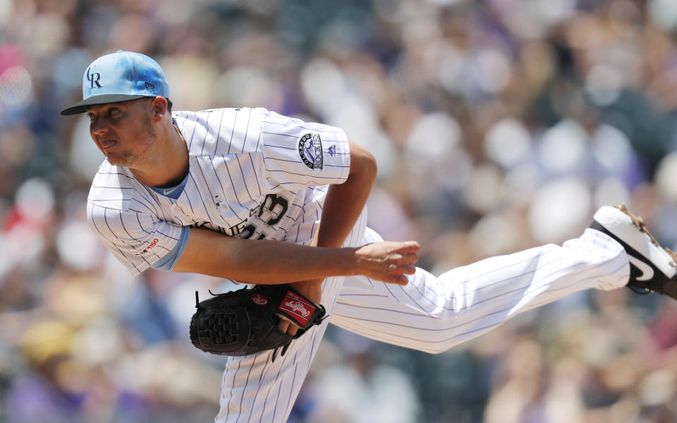 Colorado Rockies starting pitcher Peter Lambert works against the San Diego Padres in the first inning of a baseball game Sunday, June 16, 2019, in Denver. (AP Photo/David Zalubowski)