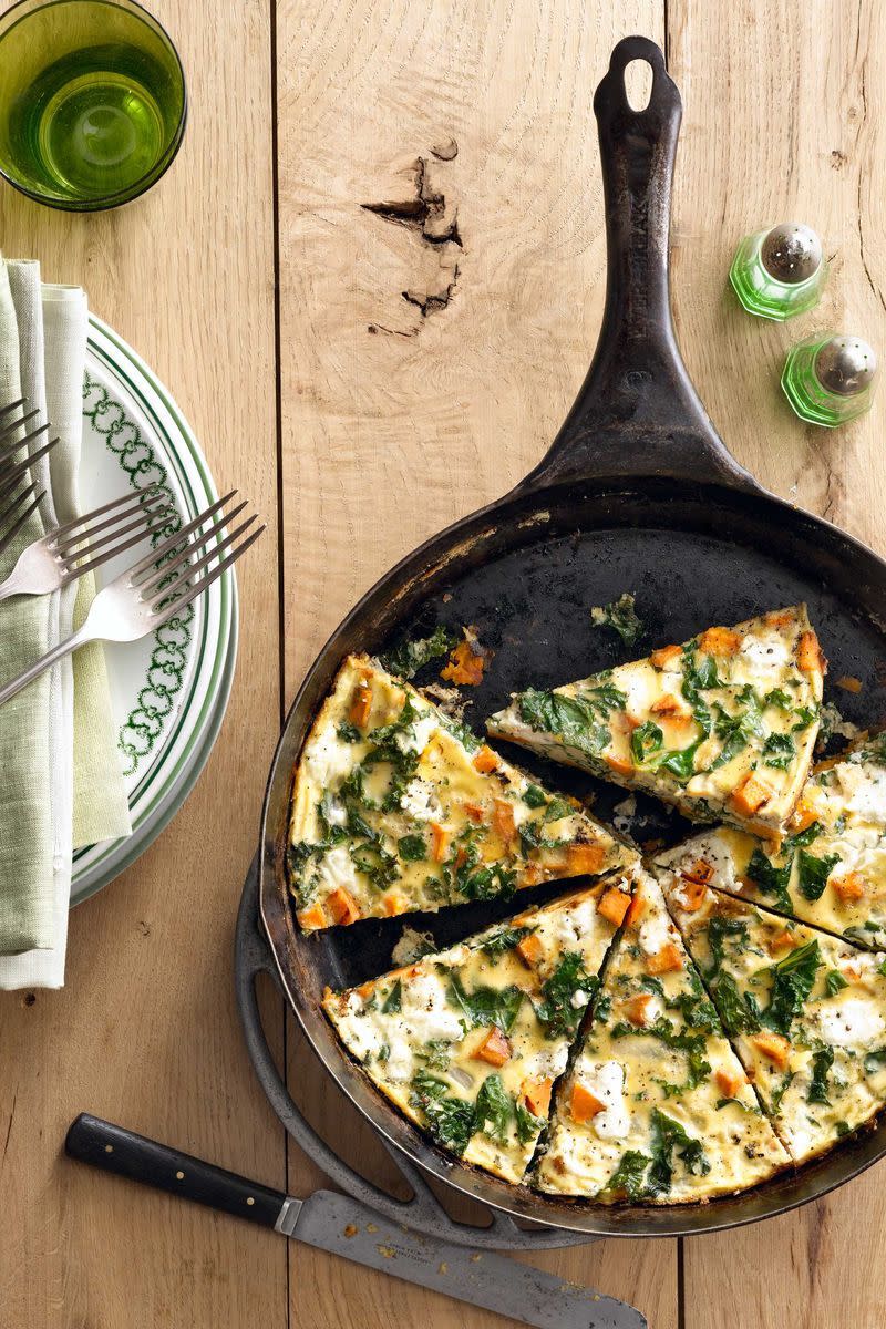 <p>The whole family will gobble up this delicious and easy frittata that is perfect for breakfast, lunch, or dinner. </p><p><strong><a href="https://www.countryliving.com/food-drinks/recipes/a5502/sweet-potato-kale-frittata-recipe-clx0914/" rel="nofollow noopener" target="_blank" data-ylk="slk:Get the recipe for Sweet Potato Kale Frittata;elm:context_link;itc:0;sec:content-canvas" class="link ">Get the recipe for Sweet Potato Kale Frittata</a>.</strong> </p>