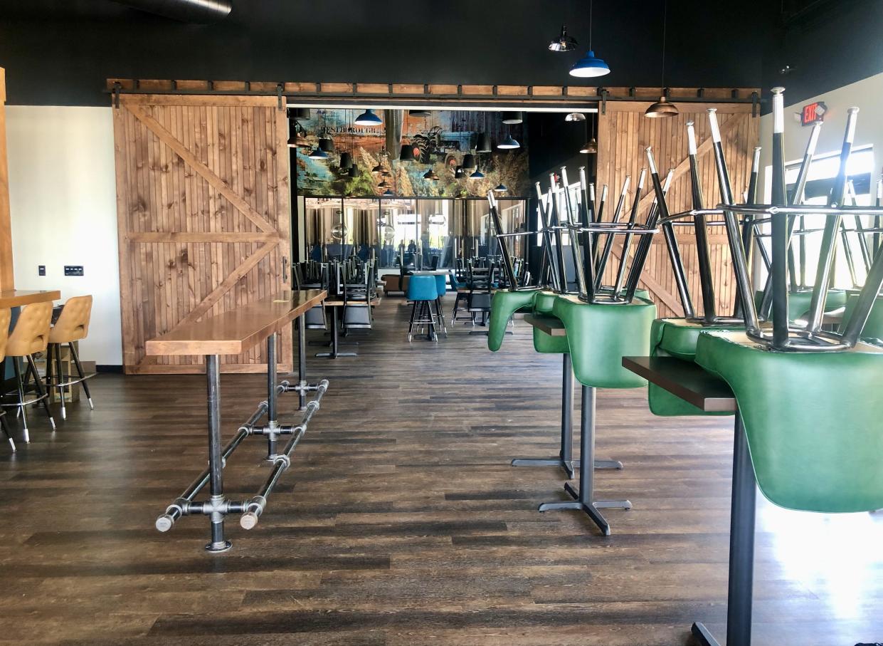 Cold Harbor Brewing's new Westborough restaurant and brewery has an events room, hidden behind two sliding barn doors.