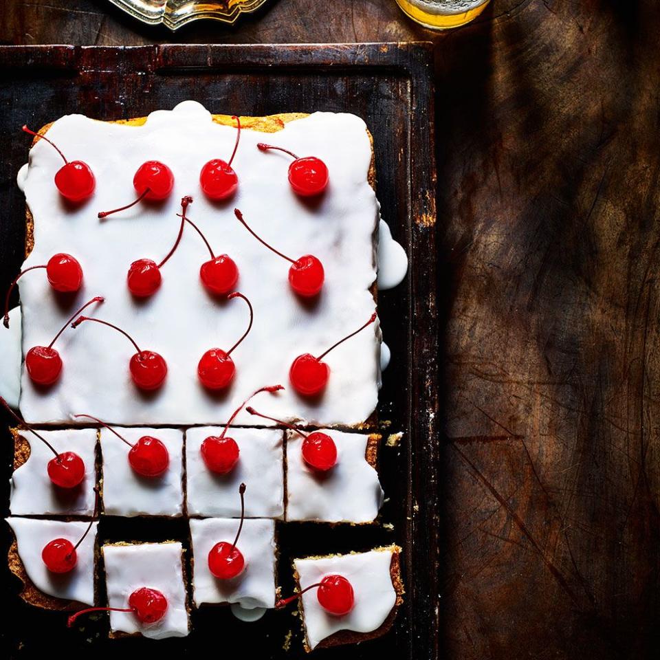 <p>A simple tray bake sponge cake is given a cocktail twist with the addition of Amaretto and cocktail cherries.</p><p><strong>Recipe: <a href="https://www.goodhousekeeping.com/uk/food/recipes/a571511/amaretto-sour-traybake/" rel="nofollow noopener" target="_blank" data-ylk="slk:Amaretto Sour Tray Bake;elm:context_link;itc:0;sec:content-canvas" class="link ">Amaretto Sour Tray Bake</a></strong></p>