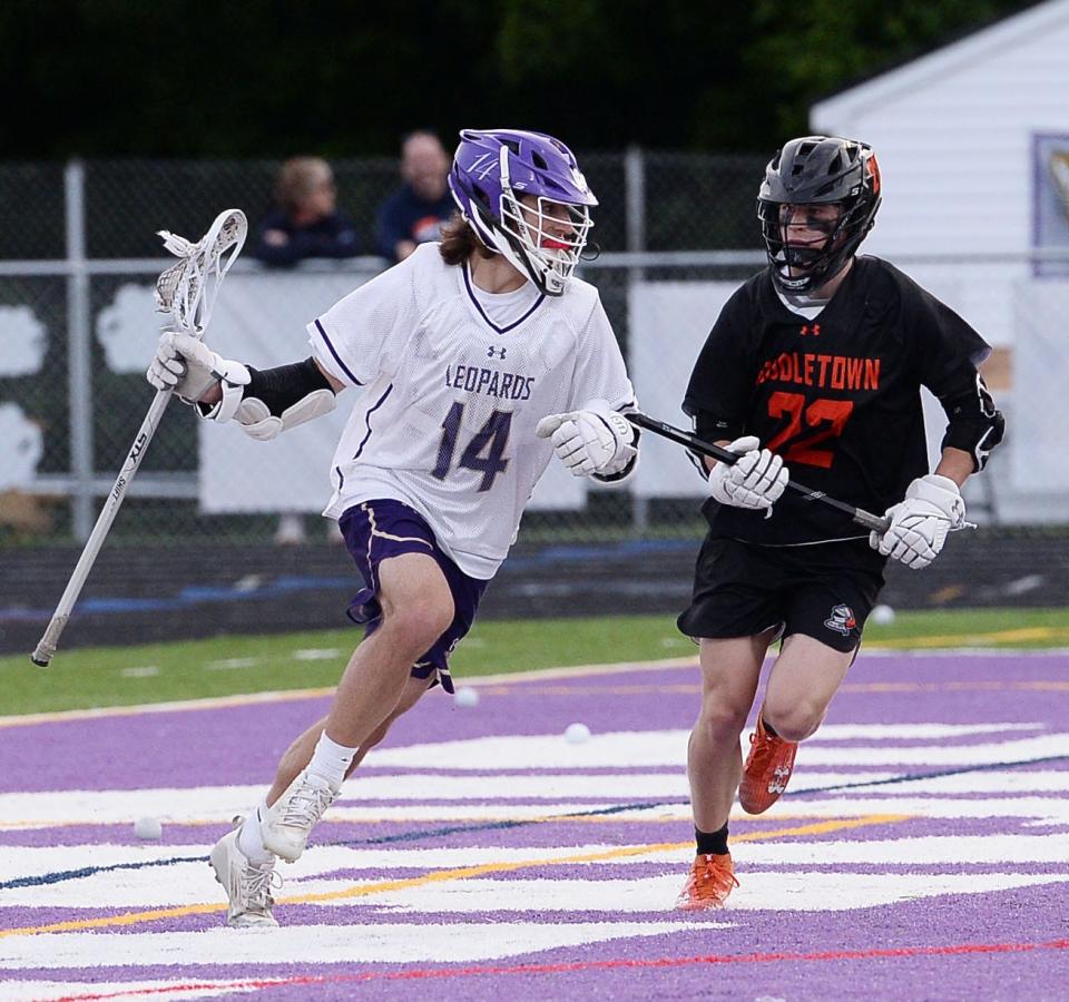 Smithsburg's Blake Linn is defended by Ryan McLister during the Leopards' 12-9 victory in the 1A West Region II final. Linn had three goals and an assist in the game.