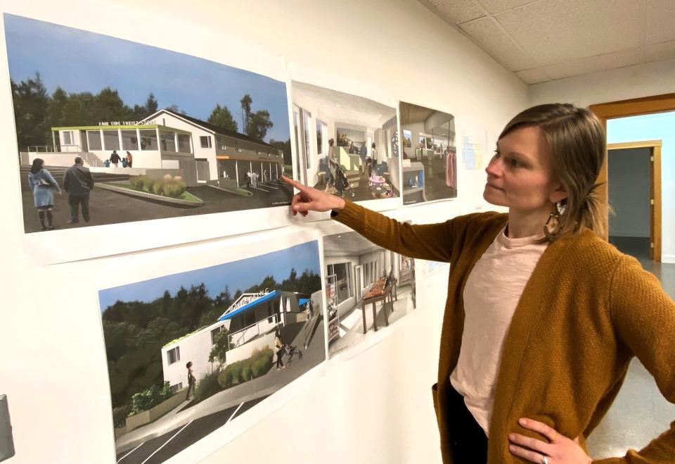 A larger, renovated building called Mainspring at 22 Shapleigh Road in Kittery will feature a new market-type Footprints Food Pantry, the housing agency called Fair Tide and its popular thrift store, and a number of social service agencies. Here, Fair Tide executive director Emily Flinkstrom points out some of the features in an architect’s rendering. A groundbreaking is planned for some time in November.