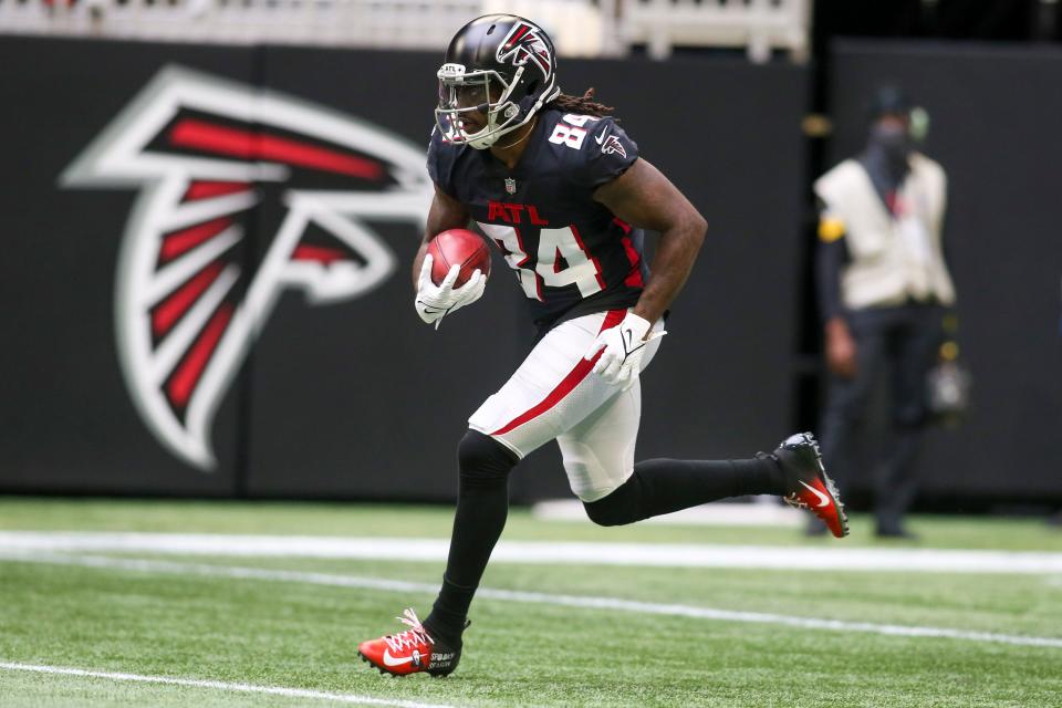 Atlanta Falcons running back Cordarrelle Patterson (84) returns a kick against the Carolina Panthers in the first quarter at Mercedes-Benz Stadium.