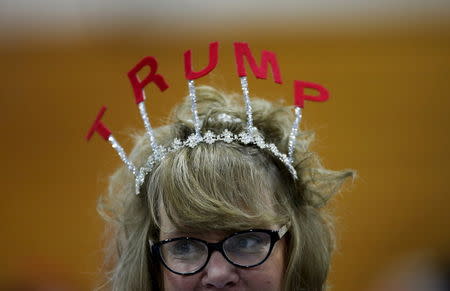 A supporter of Trump attends a campaign rally in Cadillac, Michigan. REUTERS/Jim Young