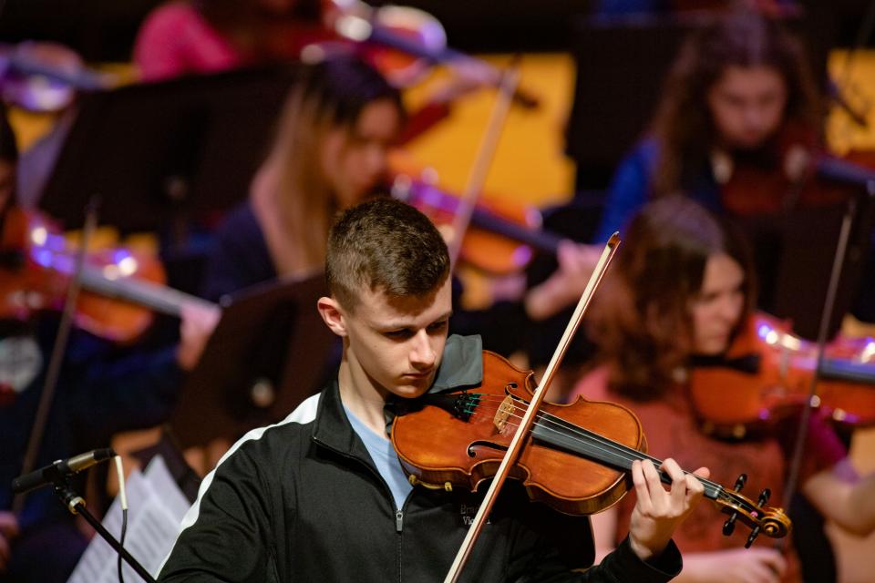 Braden Riley rehearses his solo piece on his violin during dress rehearsal with the EVSC Youth Honors Orchestra at Victory Theatre in Downtown Evansville on Wednesday, March 1, 2023. Riley has recently been named to the Carnegie Hall Youth Youth Orchestra.