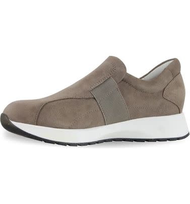 A pair of sleek slip-on sneakers sporting a contoured footbed and hefty arch support