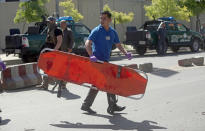 <p>A medic runs to the site of a suicide attack in Kabul, Afghanistan, Wednesday, May 31, 2017. (AP Photos/Massoud Hossaini) </p>