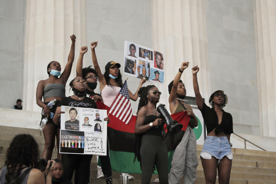 Aalayah Eastmond, a Parkland, Fla. activist, holding megaphone, leads the crowd in a call-and-response at the Lincoln Memorial in Washington on Wednesday, June 10, 2020, during protests over the death of George Floyd, a Black man who died after being restrained by Minneapolis police officers on May 25. “I unapologetically speak out for Black people and I no longer bite my tongue. ... I found myself doing that a lot at (Stoneman Douglas), being the only Black girl in my classes.” (AP Photo/Maya Alleruzzo)