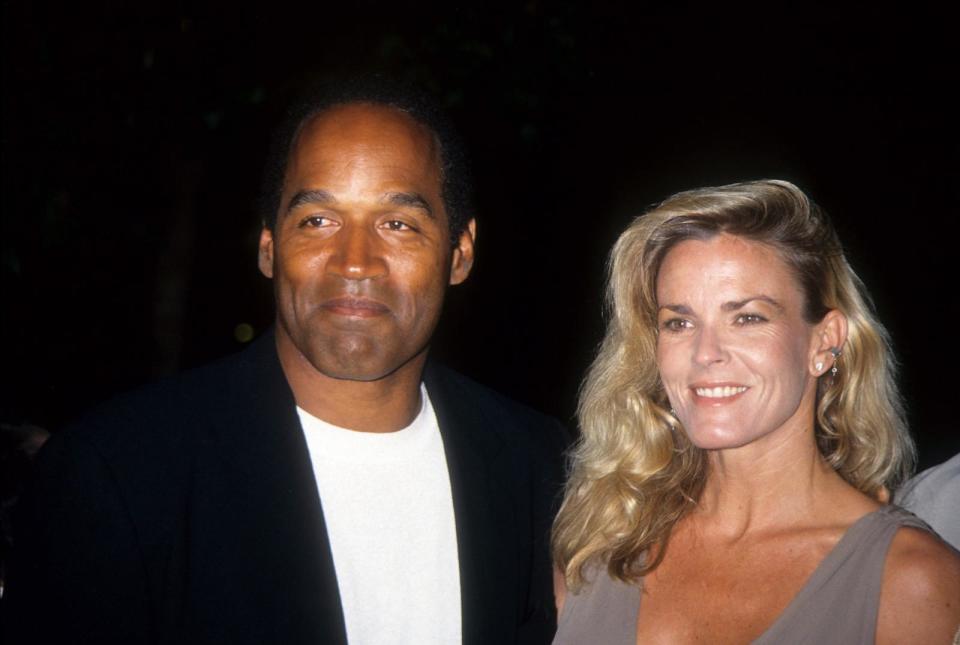 PHOTO: O.J. Simpson and Nicole Brown Simpson pose at the premiere of the 'Naked Gun 33 1/3: The Final Isult' in which O.J. starred on March 16, 1994 in Los Angeles. (Vinnie Zuffante/Getty Images, FILE)