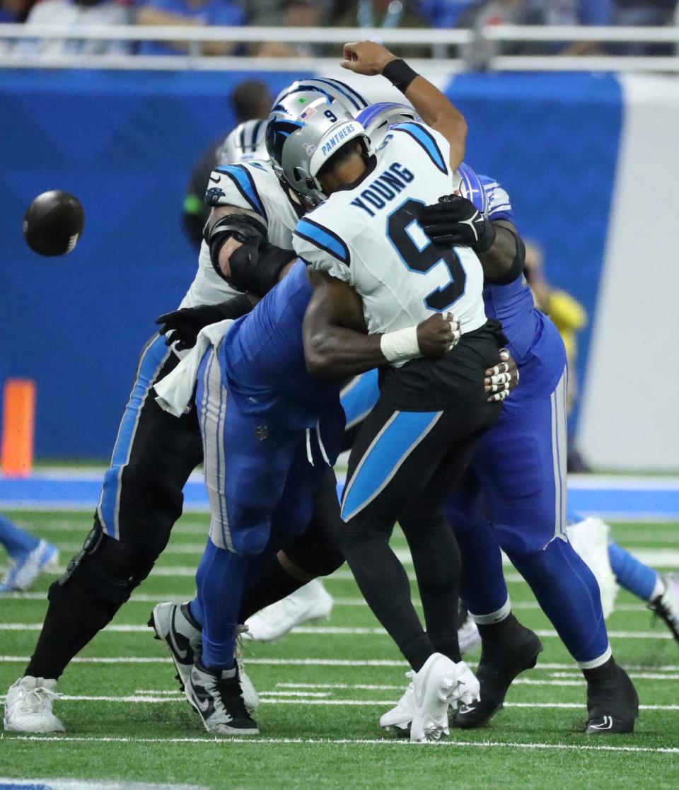 Detroit Lions defensive tackle Quinton Bohanna (90) pressures Carolina Panthers quarterback Bryce Young (9) during second-half action at Ford Field in Detroit on Sunday, Oct, 8, 2023.