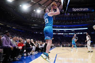 Charlotte Hornets forward Gordon Hayward (20) shoots for three points during the first half of an NBA basketball game against the New York Knicks, Monday, Jan. 17, 2022, in New York. (AP Photo/John Minchillo)