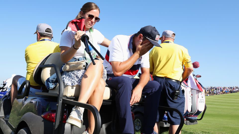 Scheffler is consoled by his wife, Meredith, after suffering a bruising loss at the 2023 Ryder Cup in Rome,. - Jamie Squire/Getty Images