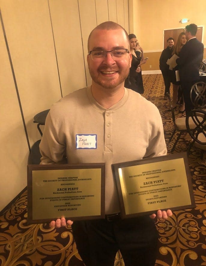 Zach Piatt wins a pair of awards at the 2023 SPJ banquet.