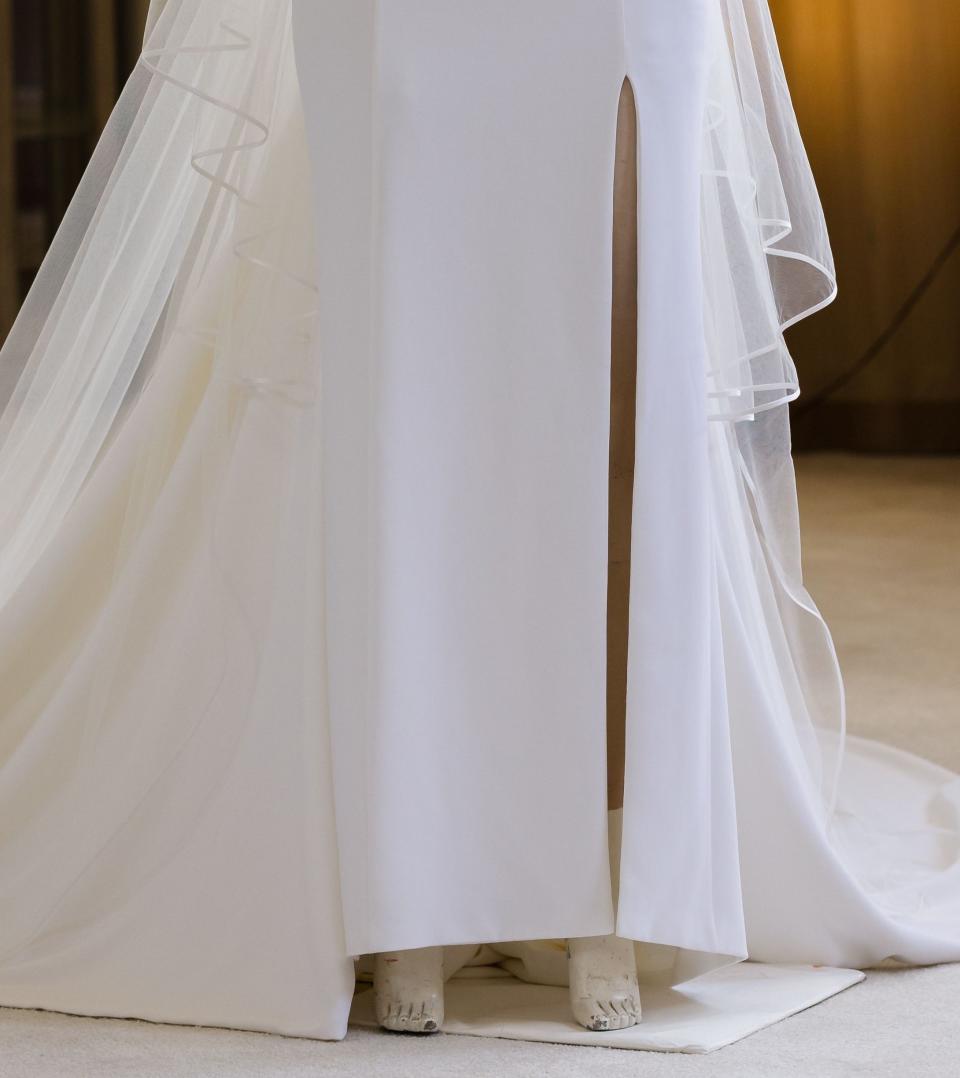 Bottom of wedding gown on a mannequin