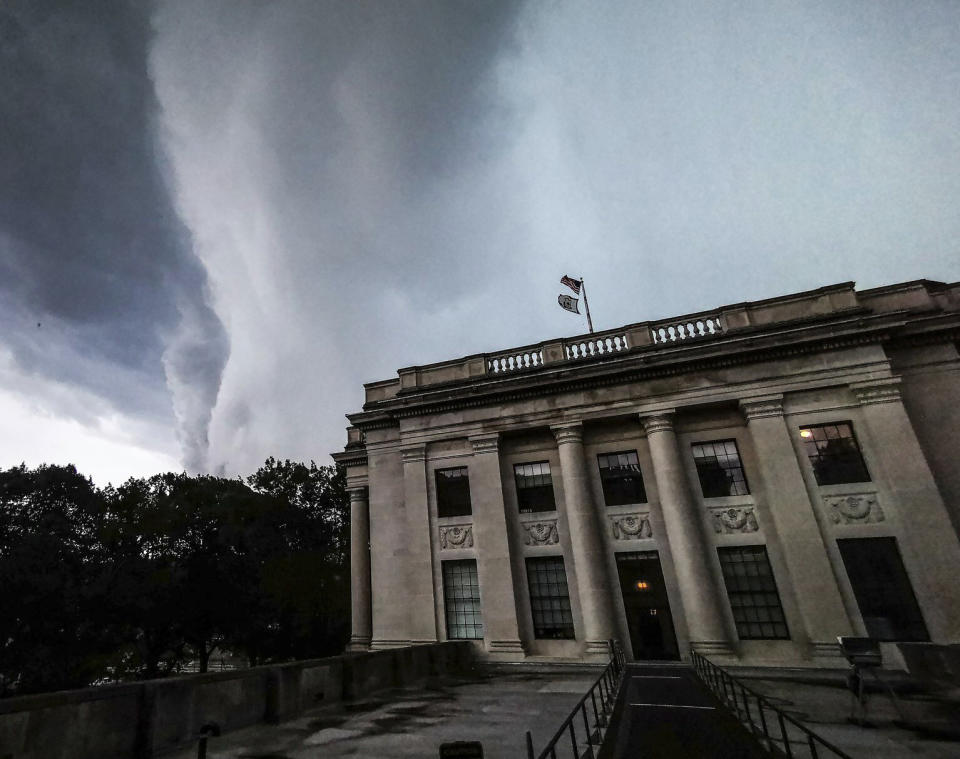 In this Monday, June 24, 2019 photo, provided by the WV Legislative Photography, storm clouds form over the state Capitol in Charleston, W.Va. (Perry Bennett /WV Legislative Photography via AP)