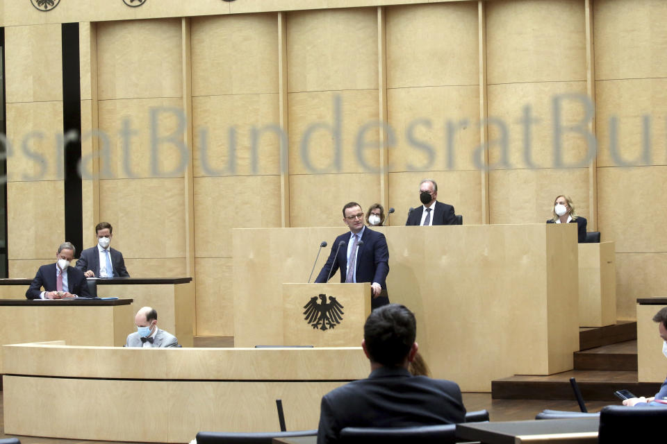 Jens Spahn, German Minister of Health, speaks in the Bundesrat in Berlin, Germany, Thursday, April 22, 2021. A plan by German Chancellor Angela Merkel’s government to mandate uniform restrictions in areas where the coronavirus is spreading too quickly has cleared its final legislative hurdle. (Wolfgang Kumm/dpa via AP)