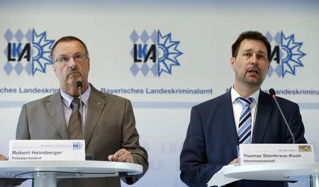 President of the Bavarian State Office of Criminal Investigation Robert Heimberger (L) and Senior Prosecutor Thomas Steinkraus-Koch attend a news conference after a shooting rampage at the the Olympia shopping mal in Munich, Germany July 24, 2016. REUTERS/Arnd Wiegmann