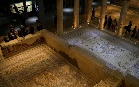 Several pieces of the mosaic were looted in the 1960s. - Credit: REUTERS/Umit Bektas