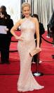 Penelope Ann Miller<br> Grade: B <br><br>“The Artist’s” Penelope Ann Miller dazzled in a form-fitting halter neck gown that she co-designed with Badgley Mischka. “I really wanted something that was ‘30s-inspired,” she noted on the red carpet, adding that she was also sporting a rare three-carat pink diamond ring and art-deco cuff by Blue Nile.