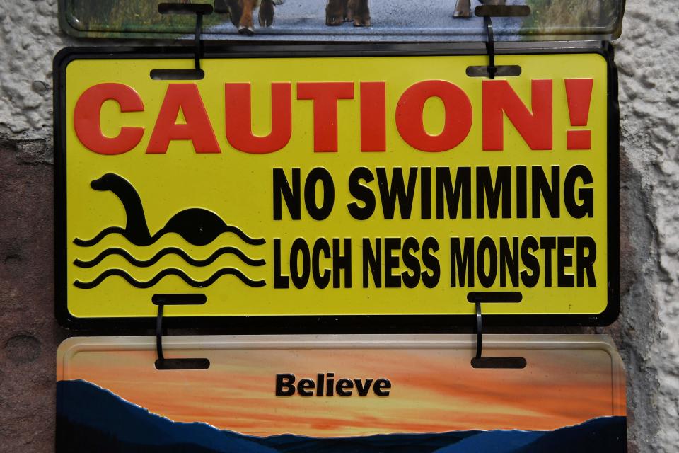 Loch Ness monster-themed signs are sold at Nessieland in Drumnadrochit in the Scottish Highlands on Aug. 27, 2023.