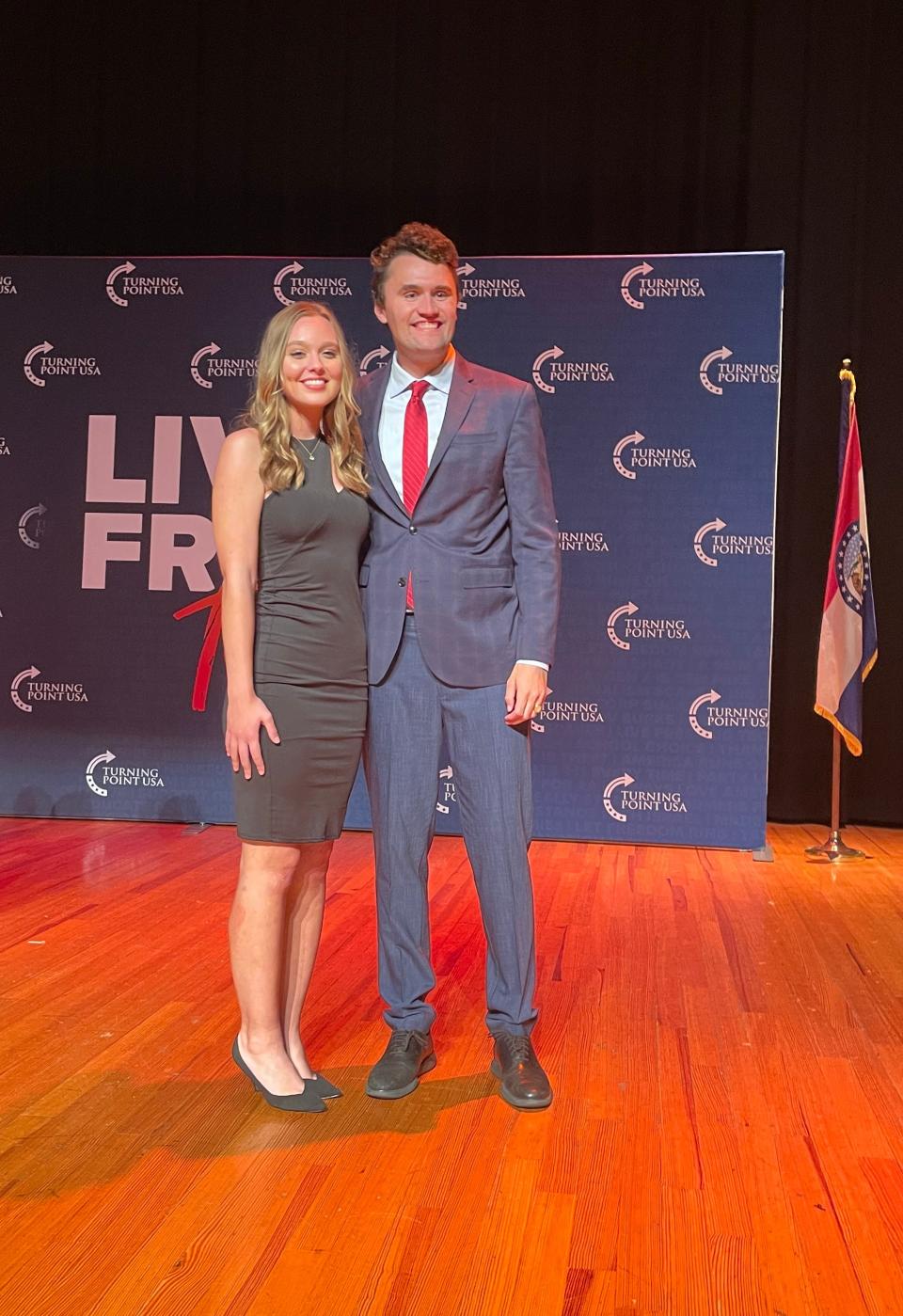 Charlie Kirk, founder of Turning Point USA, poses for a photo with Mattea Miller, president of MSU's Turning Point USA chapter at the Plaster Student Union Theater on the Missouri State University campus in Springfield on October 19, 2023.