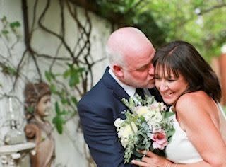 The author and Michael Savage celebrating on their wedding day, July 7, 2018. (Photo: Courtesy of Marci Glidden Savage)