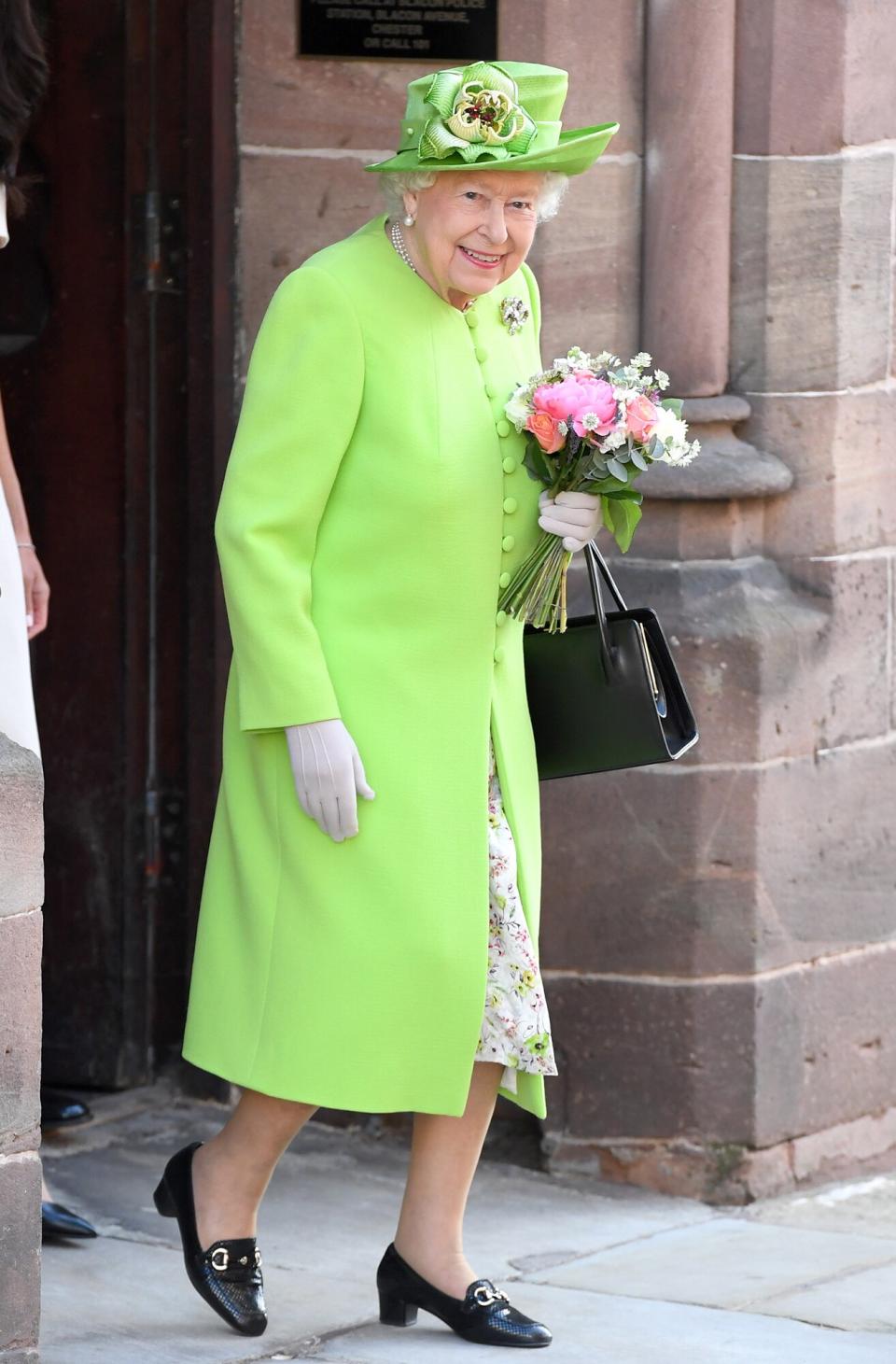 Queen Elizabeth II departs Chester Town Hall, where she attended lunch with Meghan, Duchess of Sussex as guests of Chester City Council on June 14, 2018 in Chester, England. Meghan Markle married Prince Harry last month to become The Duchess of Sussex and this is her first engagement with the Queen. During the visit the pair opened a road bridge in Widnes and visited The Storyhouse in Chester