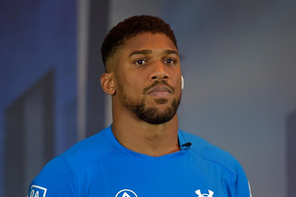 British boxer Anthony Joshua attends a press conference ahead of the heavyweight boxing rematch for the WBA, WBO, IBO and IBF titles in Jeddah on August 17, 2022. (Photo by Amer HILABI / AFP) (Photo by AMER HILABI/AFP via Getty Images)