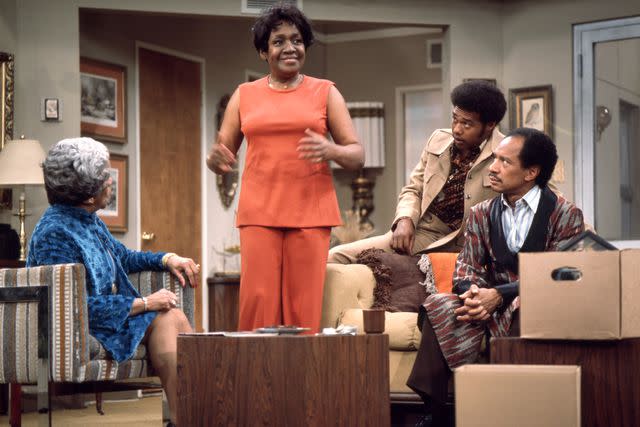 <p>CBS via Getty </p> Sanford with (from left) Zara Cully, Mike Evans and Sherman Hemsley on 'The Jeffersons.'