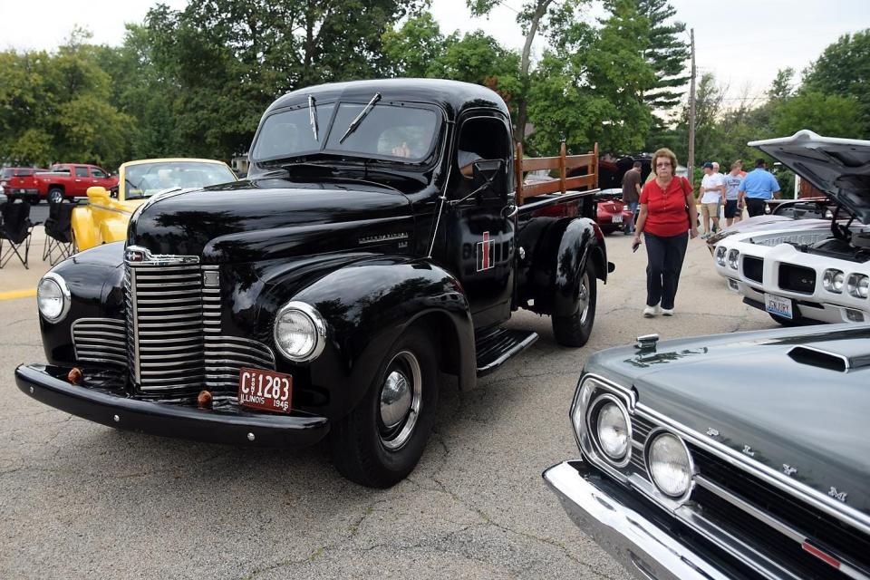In this file photo, a 1946 International pickup truck makes its way through the crowd to find a parking space during the 2017 Knoxville Car Cruise.